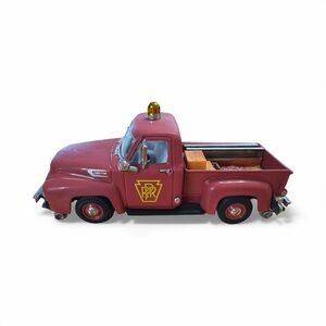 Vintage Red Toy Pickup Truck with Yellow Accents